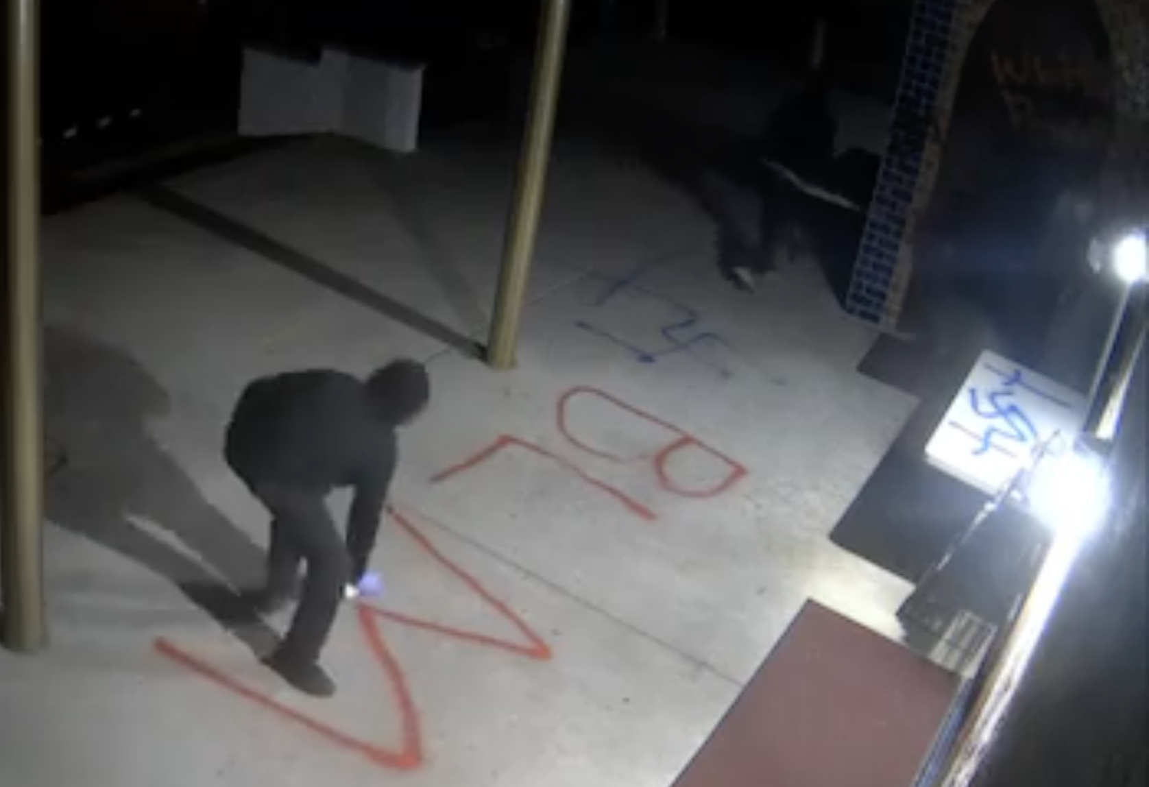 BLM thug paints swastikas at Catholic Church