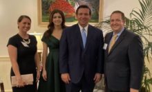 Gov. Ron DeSantis and Evan Power